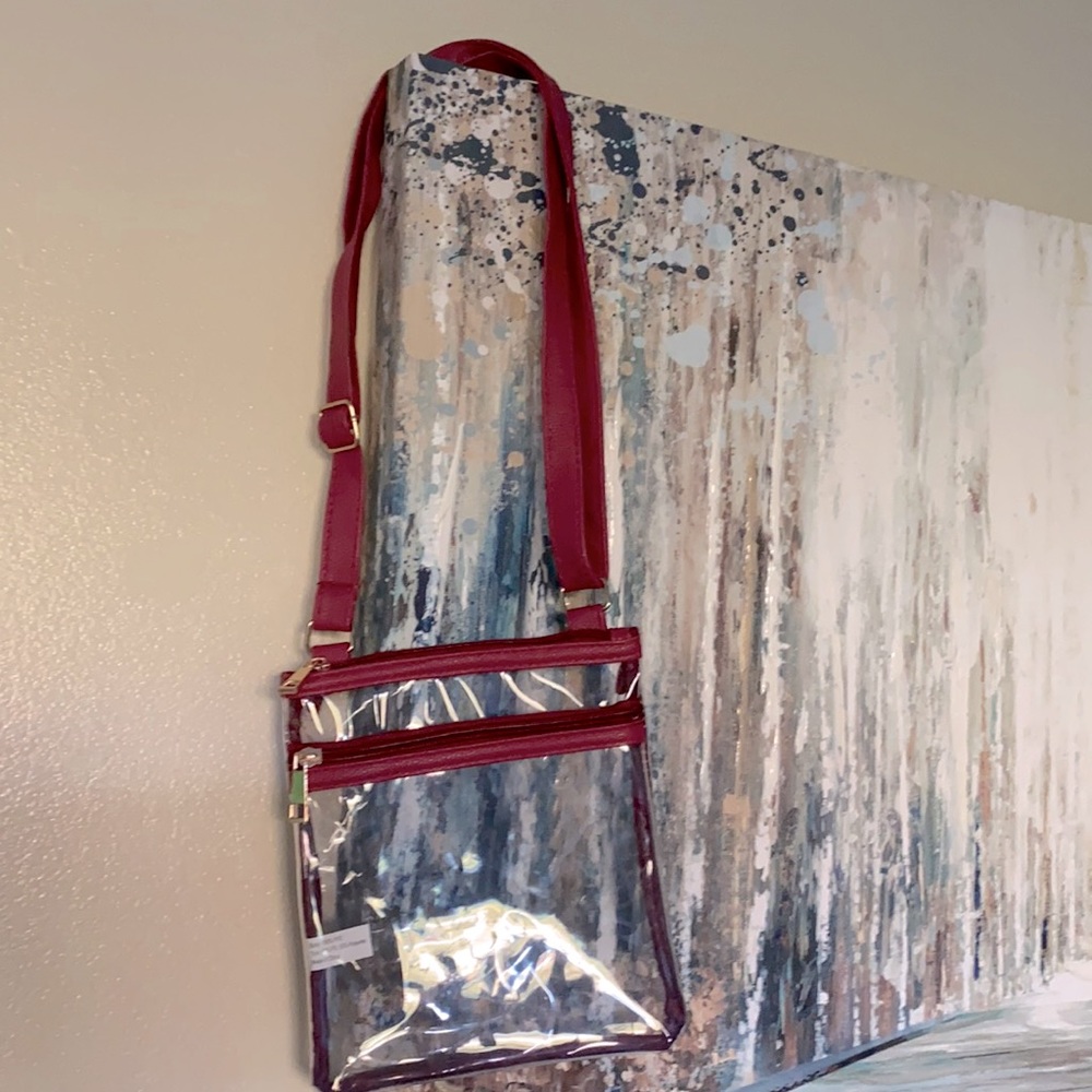 Clear purse with adjustable strap. Great for the airport or a job also in black